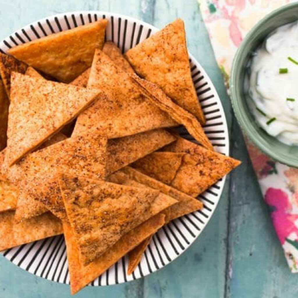 Homemade paprika tortilla chips with dip