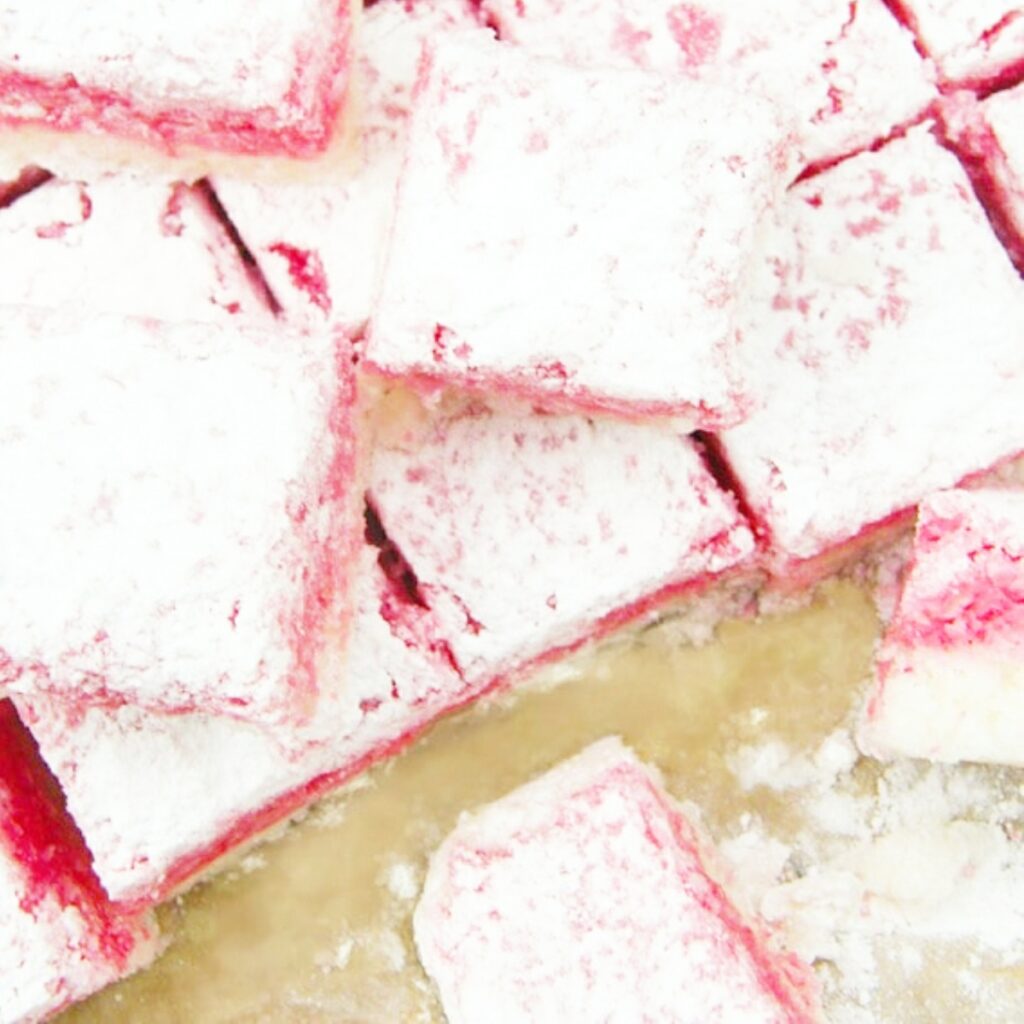 Vegan coconut ice cut into squares