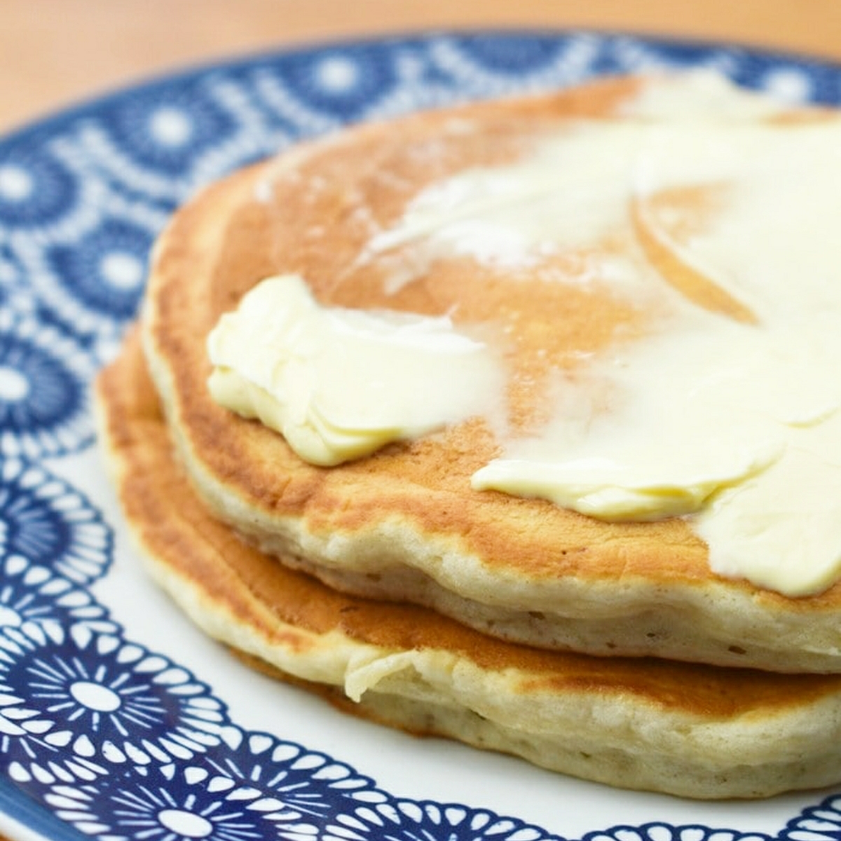 Banana scotch pancakes buttered.