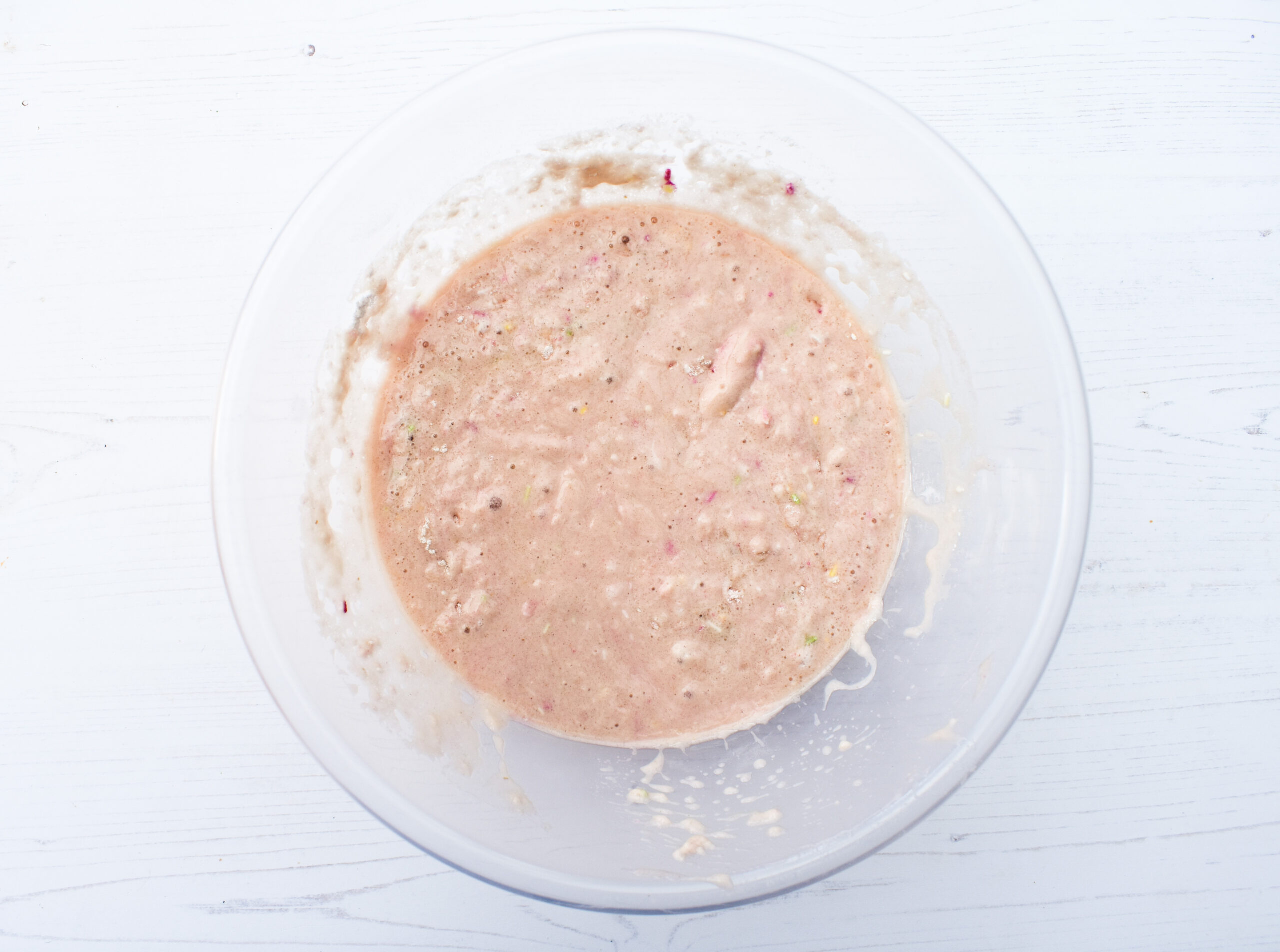 oil and milk mix poured into the dry ingredients and mixed in.