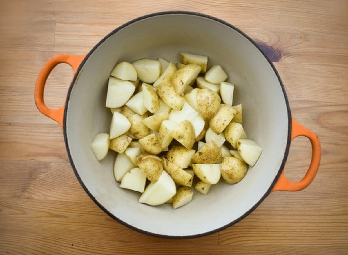 Cooked potatoes in a pot.