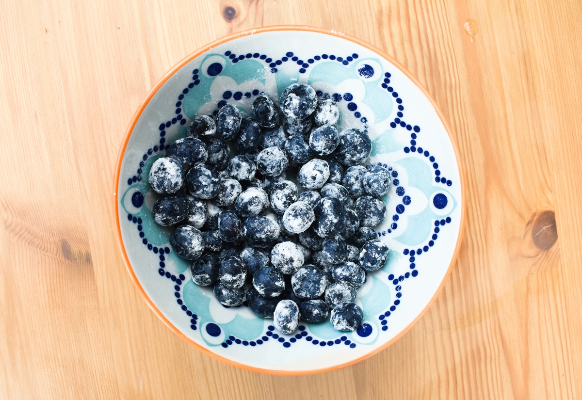 blueberry muffins step 4 - toss the blueberries in a little flour before adding them.