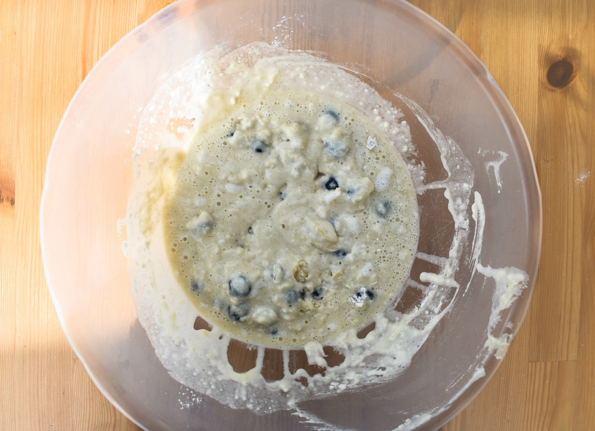blueberry muffins step 6 - fold the dry ingredients into the wet ingredients until just combined.