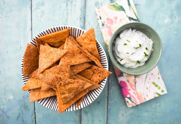 Easy Homemade Paprika Tortilla Chips served with lemon dip.