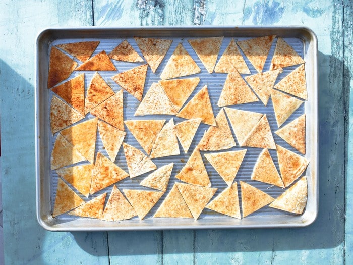 making paprika tortilla chips - step 4 - all the chips coated.