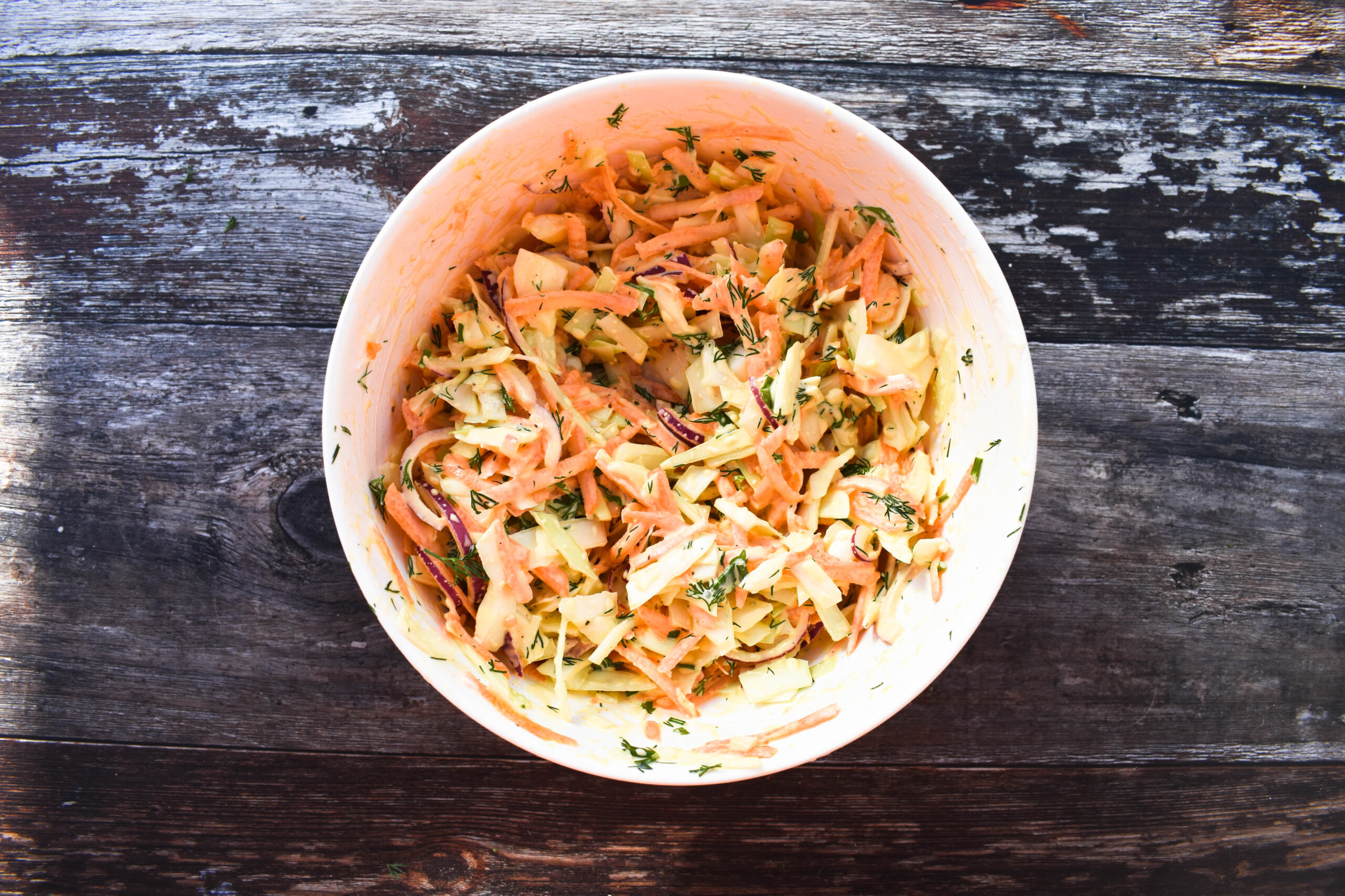 making vegan carrot & dill coleslaw -step 4 - mix the slaw