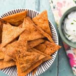 Homemade paprika tortilla chips with dip