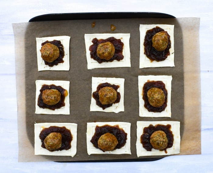 Mini Falafel Pies - Step 5 - brush the falafel with apricot jam and add a sprinkle of oregano.