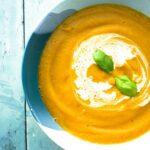 roasted butternut squash soup with a swirl of cream