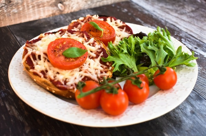 easy quick pizza on a olate with salad