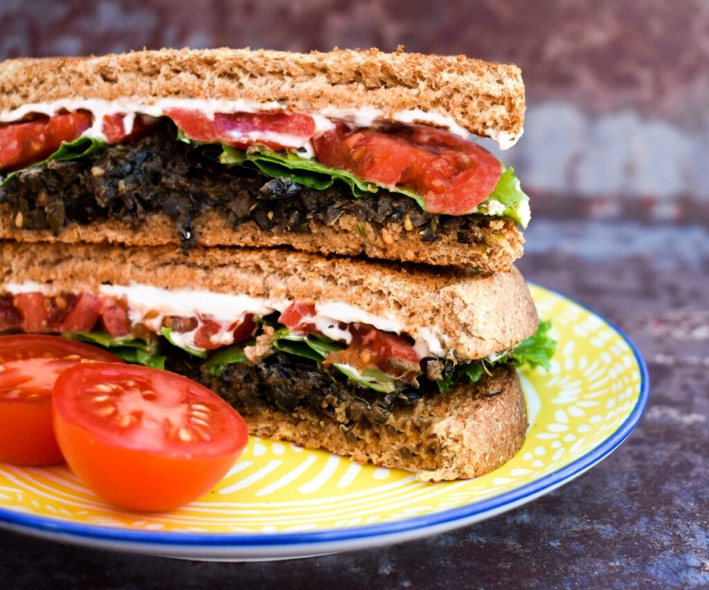 olive tapenade and tomato sandwich