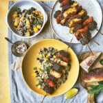 BBQ Jerk Tofu Skewers served with mango and black bean rice