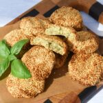 Air fryer white bean falafel with sesame seeds.