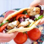 Falafel beet salad wrap with tahini dressing.