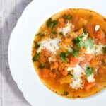 homemade sweet potato soup with a splash of cream