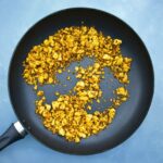 Teriyaki tofu crumbles in a frying pan