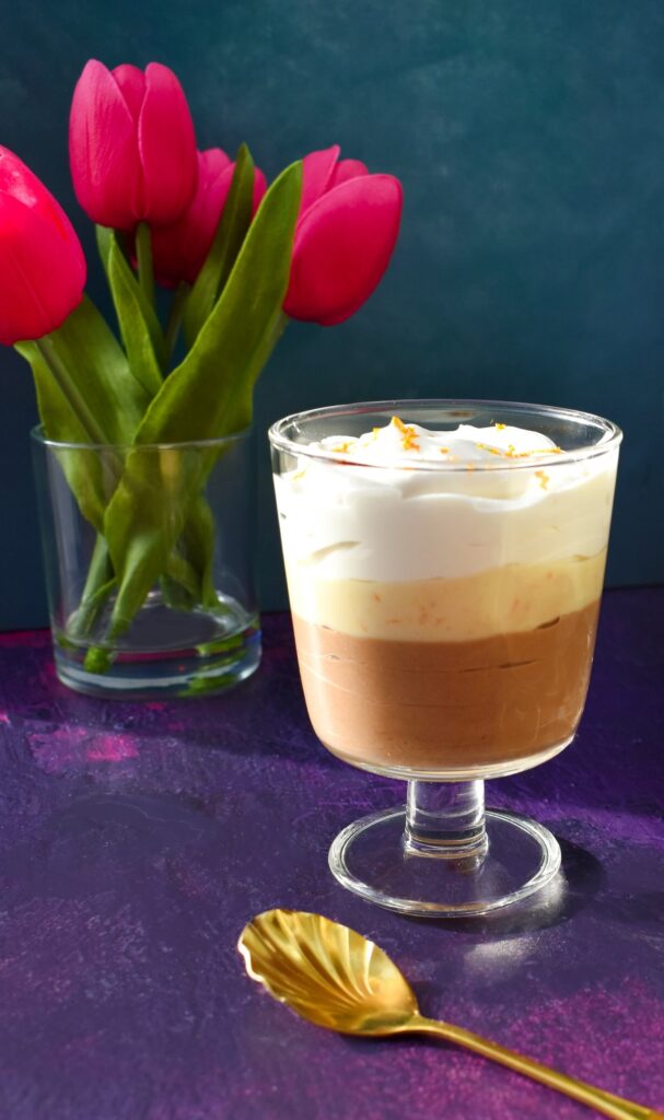 Dairy-free chocolate orange mousse in wine glasses.