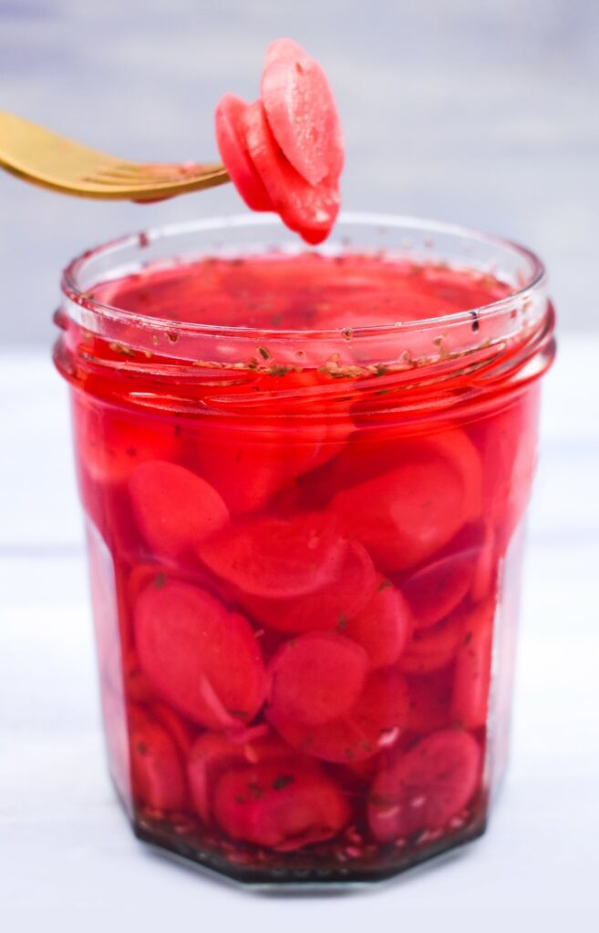Quick and easy pickled radishes.