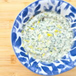 Creamy vegan mango chutney and herb salad dressing.