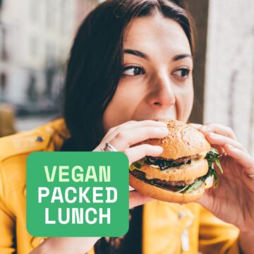 Woman eating a sandwich.
